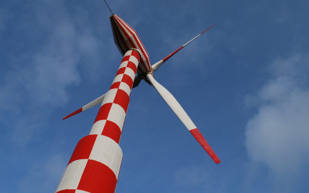 Tvindkraft wind turbine painted in chequered red and white pattern